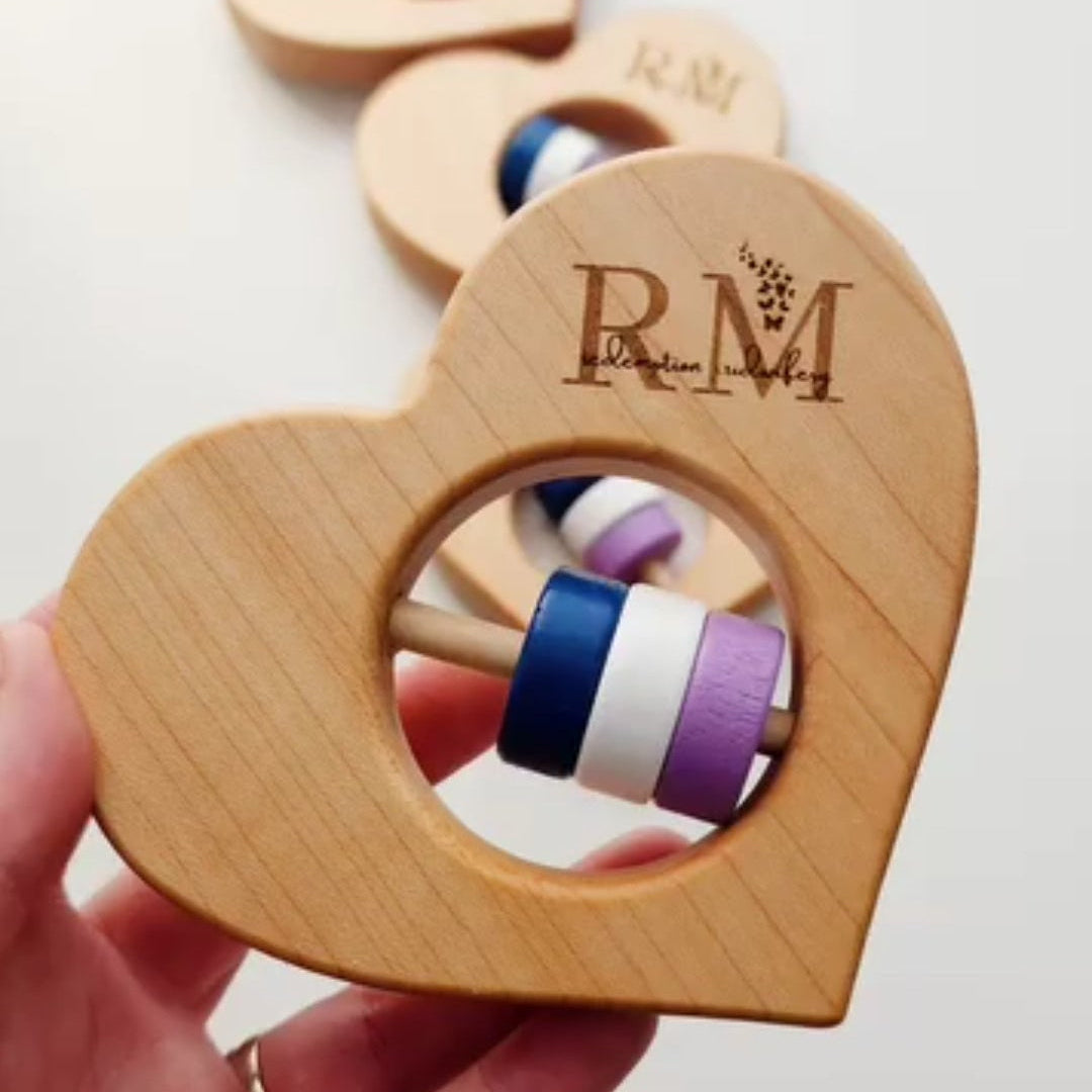 Logo engraved wooden baby toys for hospitals, OB-GYN offices and daycares