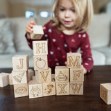 Child playing with wooden blocks